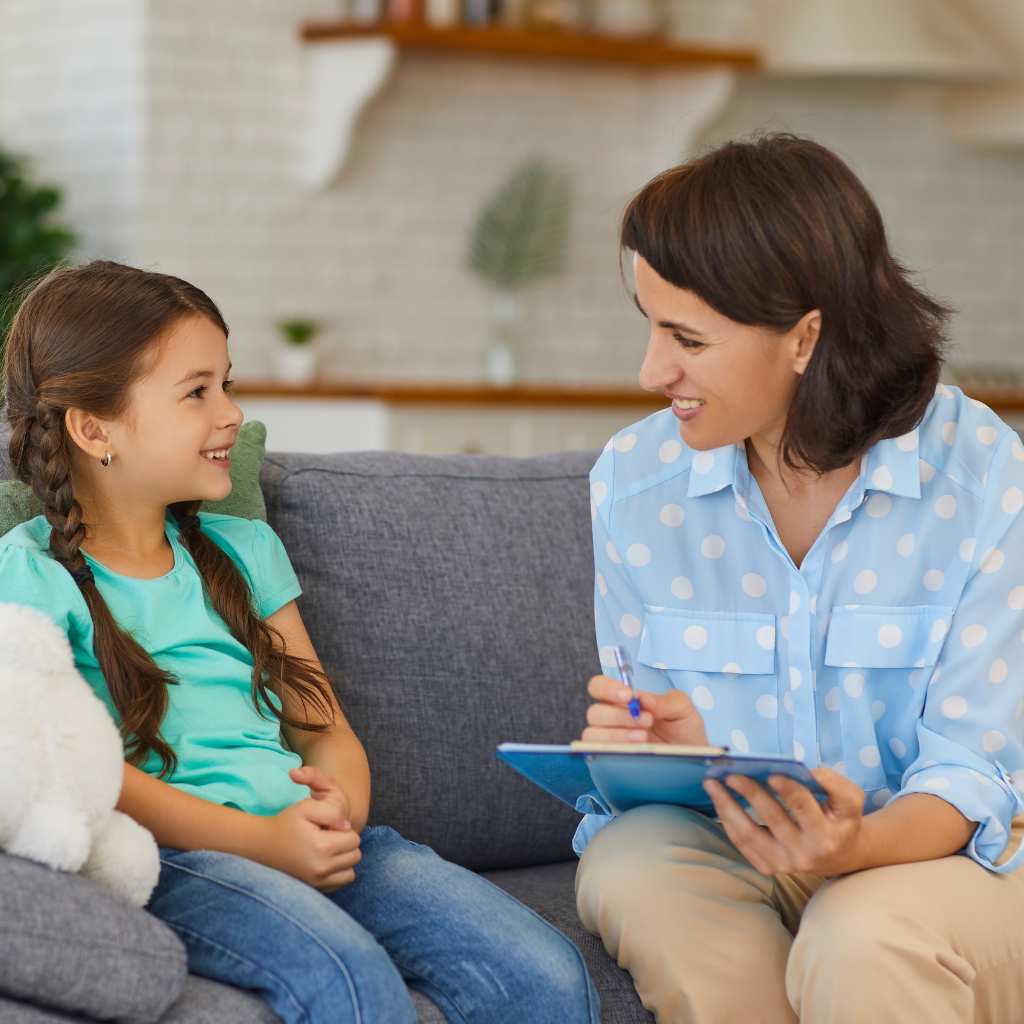 BA therapist working with child to build communication and daily living skills