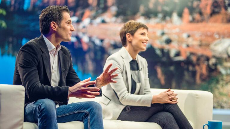 Guests in a talk show, representing a discussion about celebrities with autism and the importance of autism visibility.