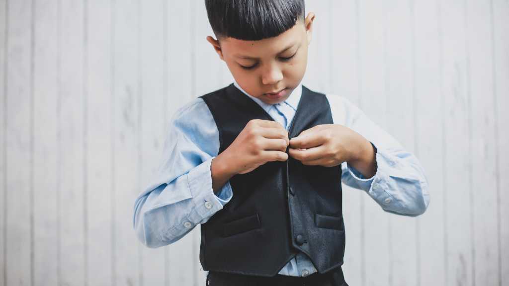 Child learning independence for individuals with autism through daily self care skills